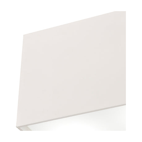 Close-up of the Kailua 2 Light GU10 Flush Ceiling Light, a shallow rectangular fitting in matt white, shown at an angle against a plain white background.