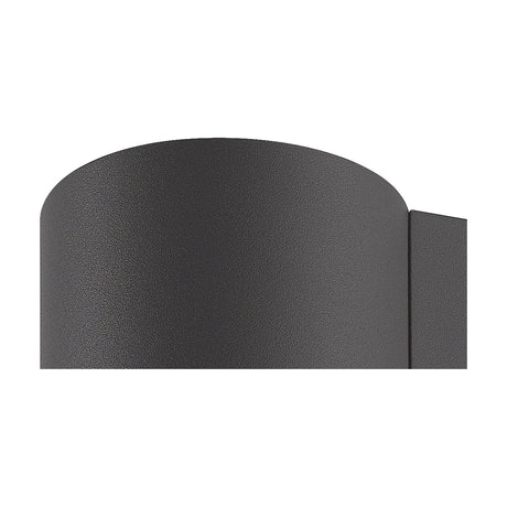 Close-up of the Volcano IP54 Outdoor Wall Light in graphite, showing its curved half-cylinder aluminium body and textured matte finish against a plain white background.