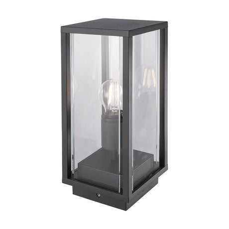 Meribel E27 IP54 post light in graphite, a square aluminium and glass lantern with clear glass panels and a visible bulb, shown on a plain white background.