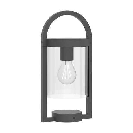 Maya E27 IP54 post light in anthracite aluminium with an arched top handle and clear glass cylinder shade exposing the bulb, set on a round base against a plain white background.