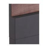 Close-up of the Ruka Floor Lamp's anthracite base and walnut wood top edge, showing the join between matte metal body and textured wood panel.