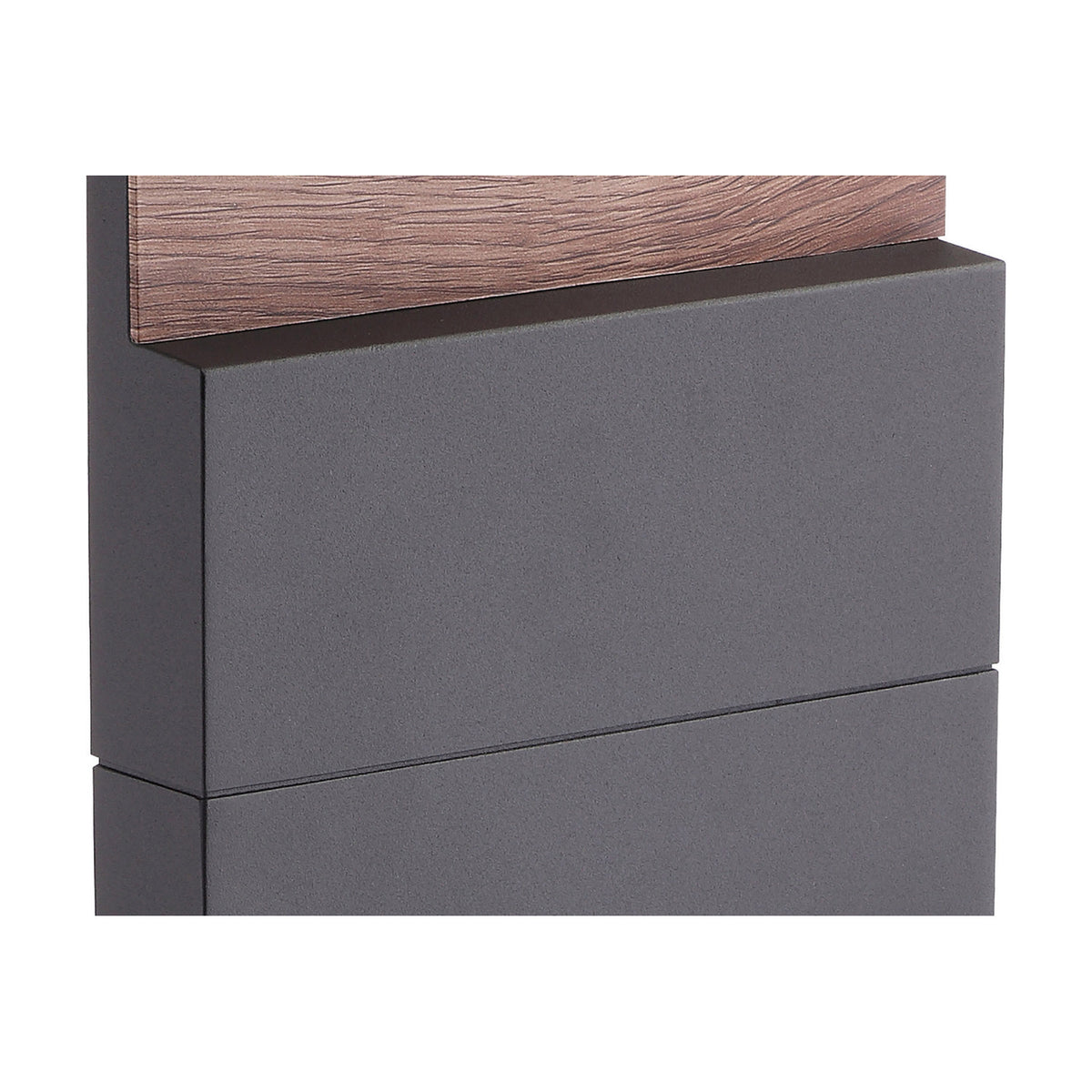 Close-up of the Ruka Floor Lamp's anthracite body and integrated LED housing beside a walnut wood panel, showing the matte finish and seam details.