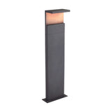 Ruka Floor Lamp, a slim anthracite aluminium post with a flat overhanging top and warm walnut-toned diffuser panel, integrated LED, 100cm high, shown on a plain white background.