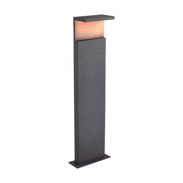 Ruka Floor Lamp, a slim anthracite aluminium post with a flat overhanging top and warm walnut-toned diffuser panel, integrated LED, 100cm high, shown on a plain white background.