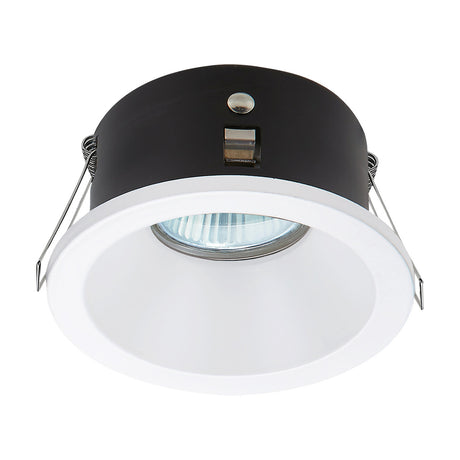Round IP54 downlight in matt white with a shallow, unadorned rim, 75mm cut-out and GU10 lampholder fitted, shown at an angle on a plain white background.