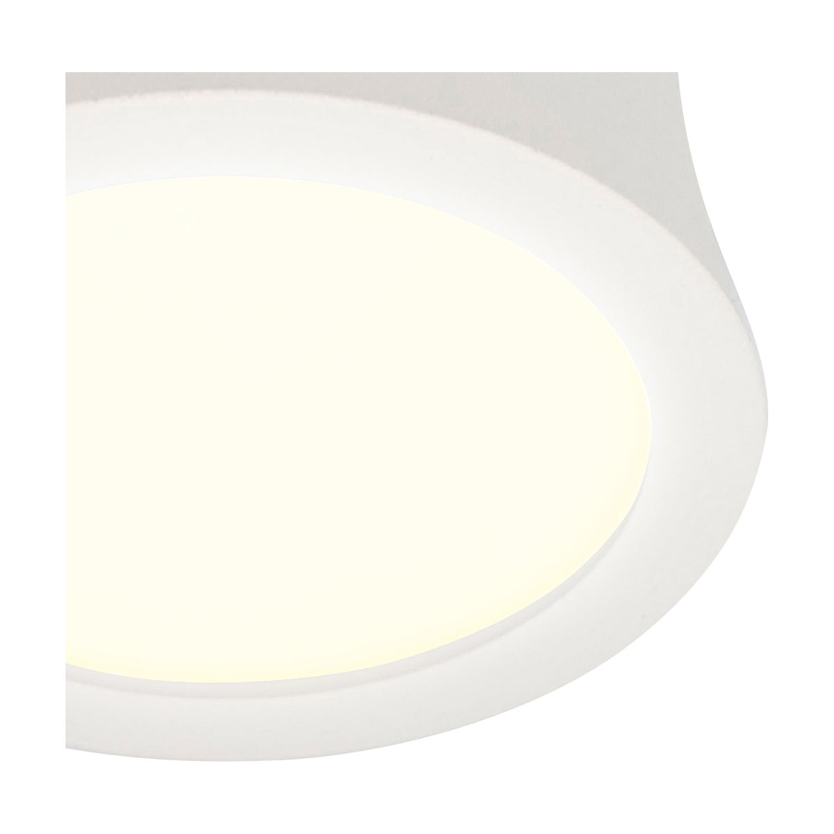 Close-up of the Gower Spotlight, a compact round LED ceiling spotlight in sand white with a recessed diffuser emitting warm white light.