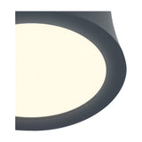 Close-up of the Gower Spotlight in sand black, showing its round aluminium frame with warm white LED diffuser, set against a plain light background.