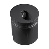 Aspen IP65 round recessed outdoor wall light in sand black aluminium, cylindrical body with angled amber-tinted LED lens on top, shown on a plain white background.
