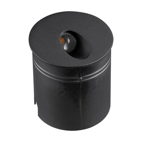 Aspen IP65 round recessed outdoor wall light in sand black aluminium, cylindrical body with angled amber-tinted LED lens on top, shown on a plain white background.