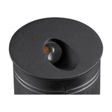Close-up of the Aspen IP65 round recessed outdoor wall light in sand black, showing its angled aluminium face with integrated LED against a white background.