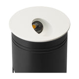 Aspen IP65 round recessed outdoor wall light with angled aperture in matt sand white, mounted on a black cylindrical post, integrated LED visible, 3000K warm white.