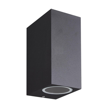 Kandanchu 2 Light IP54 outdoor wall light in sand black, a small rectangular aluminium fixture with a round glass lens visible on one side, shown on a plain white background.