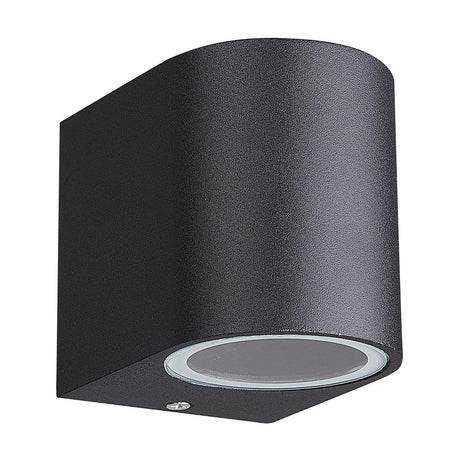 Kandanchu round outdoor wall light in sand black aluminium, cylindrical body with clear glass GU10 lens on a plain white background.