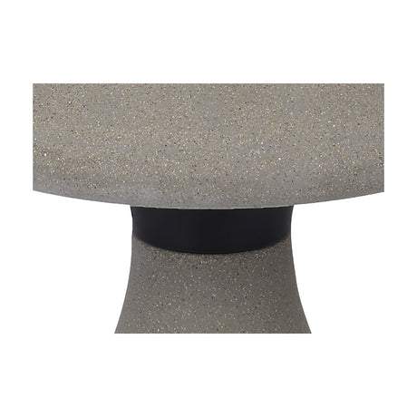 Close-up of the Taos IP65 bollard light's mushroom-shaped cap in dark grey speckled cement, with a black metal band above the tapered stem.