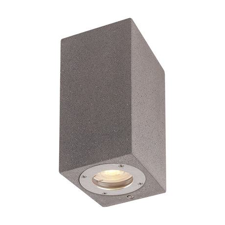 Levi IP65 rectangular outdoor wall light in grey concrete, a compact block form with a single visible GU10 downlight aperture, shown against a plain white background.