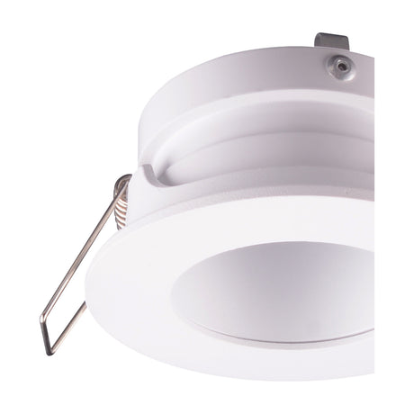Close-up of the Guincho Downlight in sand white, showing the round aluminium trim, recessed lampholder, and metal spring clip for GU10 fitting on a plain white background.