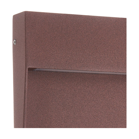 Close-up of the Baker 6W IP54 square outdoor wall light in rust brown, showing the aluminium housing, textured finish, and horizontal light slit detail.