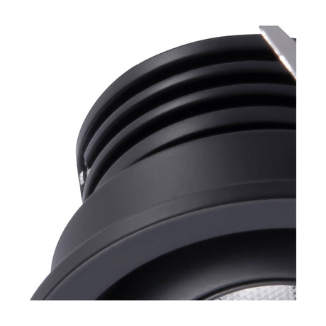 Close-up of the Neptuno Recessed Spotlight in black aluminium, 50mm trim, showing ribbed housing and adjustable swivel head with LED lens visible.