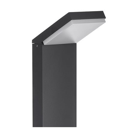 Close-up of the Alpine 12W IP65 bollard light in anthracite, showing the angled aluminium head with integrated LED panel atop a slim rectangular post, set against a plain white background.