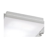 Close-up of the Magneto 12W Linear Track Light, a 25cm black bar-style LED fixture with a diffused lens emitting warm white 3000K light, shown against a plain background.