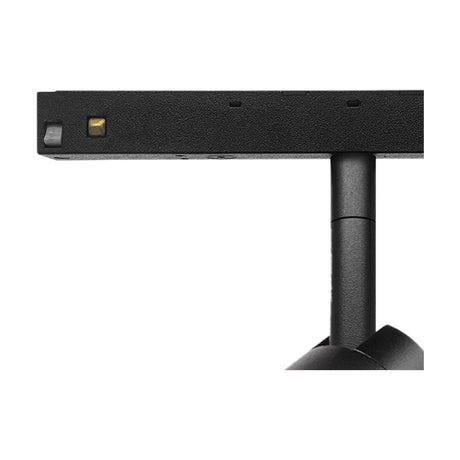 Close-up of the Magneto 7W Dimmable Track Light in matte black aluminium, showing the slim track adaptor, pivoting neck, and connection pins on a white background.