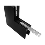 Magneto Deep 3-connector surface L-joint in black aluminium, shown at an outward corner angle with a metal mounting bracket extending from the track, on a plain white background.