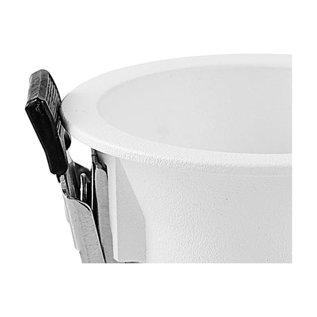 Close-up of the Trimasi Downlight in sand white, showing the round aluminium ring for a 53mm cut-out with sprung metal clips, on a plain white background.