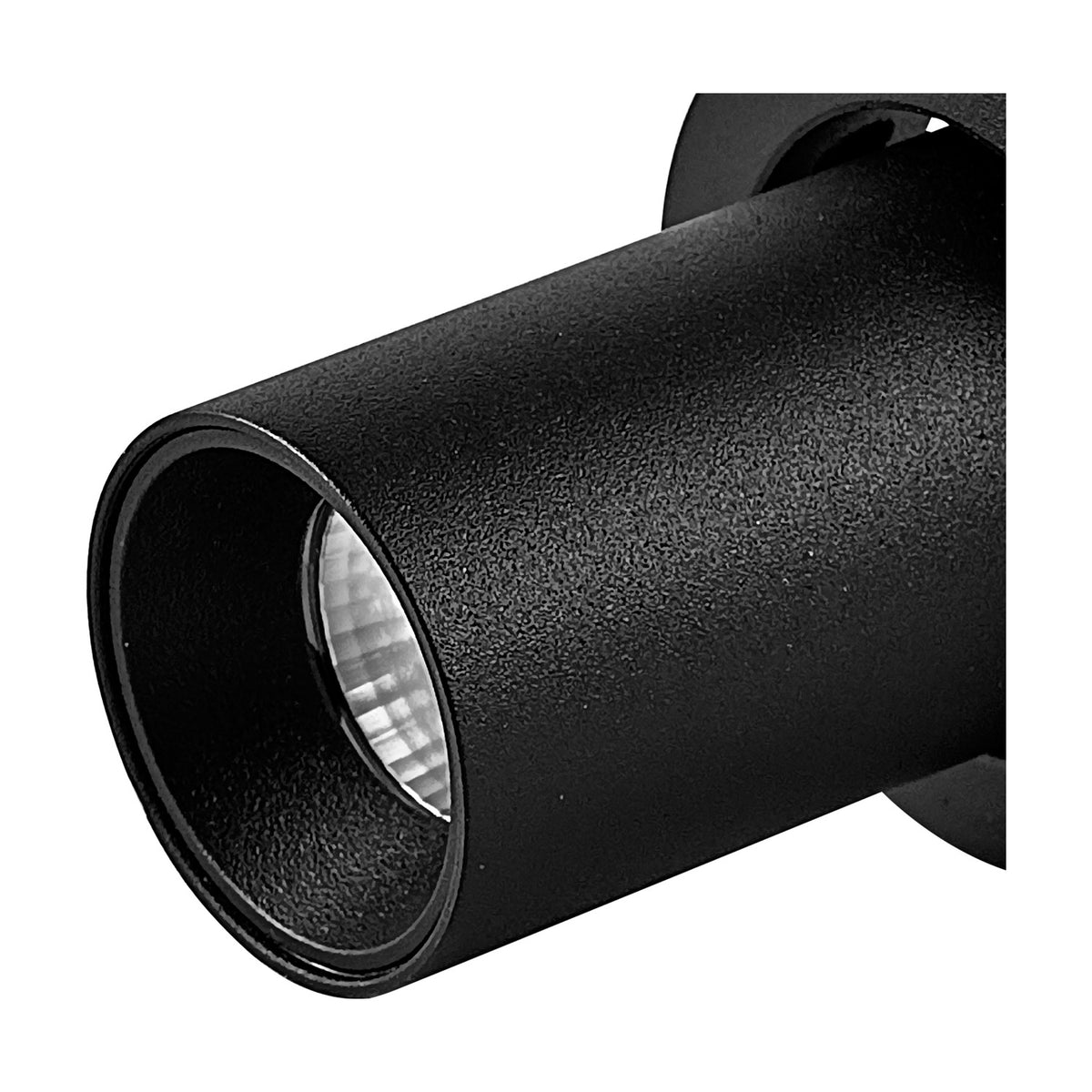 Close-up of the Trimasi Spotlight in sand black, a cylindrical aluminium spotlight head with an integrated LED lens, shown on a plain white background.