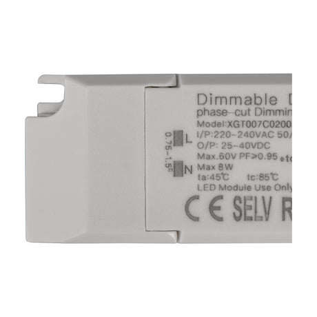 Close-up of the Sunset 8W LED Driver in white, showing printed specifications, terminal markings for L and N, and CE and SELV symbols on the casing.