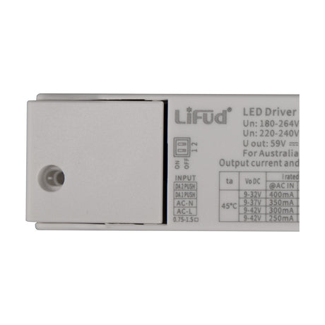 LiFud LED Driver in white plastic casing, close-up of DALI/push dimming DIP switches, input terminals, and output current specification table on a plain background.