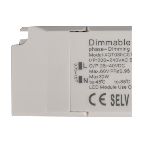 Close-up of the Sunset 30W LED Driver in white plastic casing, showing printed specifications for phase-dimming, input/output voltage, and CE SELV marks with L and N terminals.