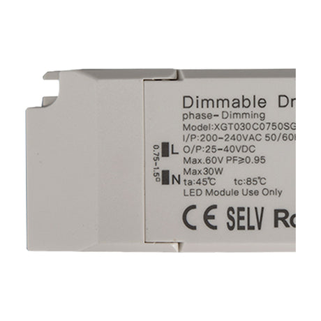 Close-up of the white Sunset 30W LED Driver casing showing printed specifications, L and N terminal markings, and CE, SELV, RoHS certification symbols.