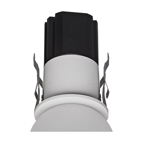 Bead 7W recessed spotlight shown rear-on with black integrated LED module, white aluminium cylindrical body, spring clips, and 35mm cut-out ring, on a plain white background.