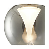Close-up of the Andromeda Round Lamp Shade 13cm in chrome, showing the mirrored glass exterior and frosted funnel centre glowing with light.