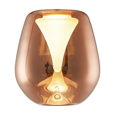 Andromeda Lamp Shade 12cm in copper-toned glass with a wine-glass silhouette and frosted inner funnel, lit from within, shown on a plain white background.