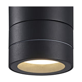 Close-up of the Saler IP65 Outdoor Wall Light in black aluminium, showing its cylindrical body and recessed round lens with warm light glowing from within.