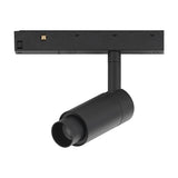 Magneto Track Light in black aluminium finish, single cylindrical head with zoom lens on angled arm, mounted to magnetic track rail, 7W LED, 3000K, shown on plain white background.