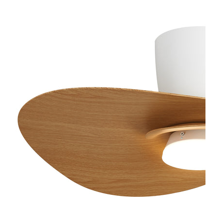 Close-up of the Nenufar Wood Ceiling Fan with Light, showing a wood-tone blade and white low-profile body with integrated LED light, on a plain background.