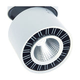 Close-up of the Columbretes Round Spotlight, 85mm matt white cylindrical head with black inner ring and integrated LED, shown on a plain white background.