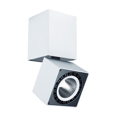 Columbretes surface-mounted spotlight in matt white aluminium with a square 76mm rotating head and black inner ring housing the LED, shown on a plain white background.