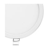 Close-up of the Saona Recessed Round Downlight in matt white, showing the wide round face with a plain unbroken rim and connector clip, set against a plain white background.
