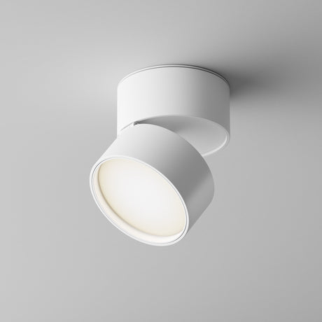 The Onda LED Single Spotlight 12W 4000K in white is a modern cylindrical ceiling fixture with an adjustable head that emits a soft, warm glow on a smooth white ceiling, providing energy-efficient performance.