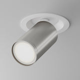The Focus S Single Recessed Spotlight in white and silver is a modern cylindrical ceiling fixture with metallic finish, mounted on a light grey surface. It features a 360° swivel for versatile downward illumination.