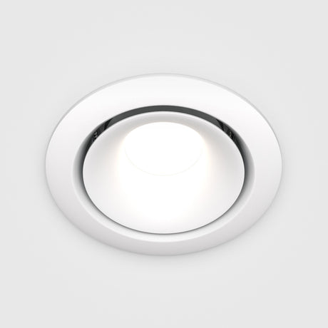 The Yin Round Recessed Downlight, a white circular LED with dimming, is illuminated against a plain white backdrop.