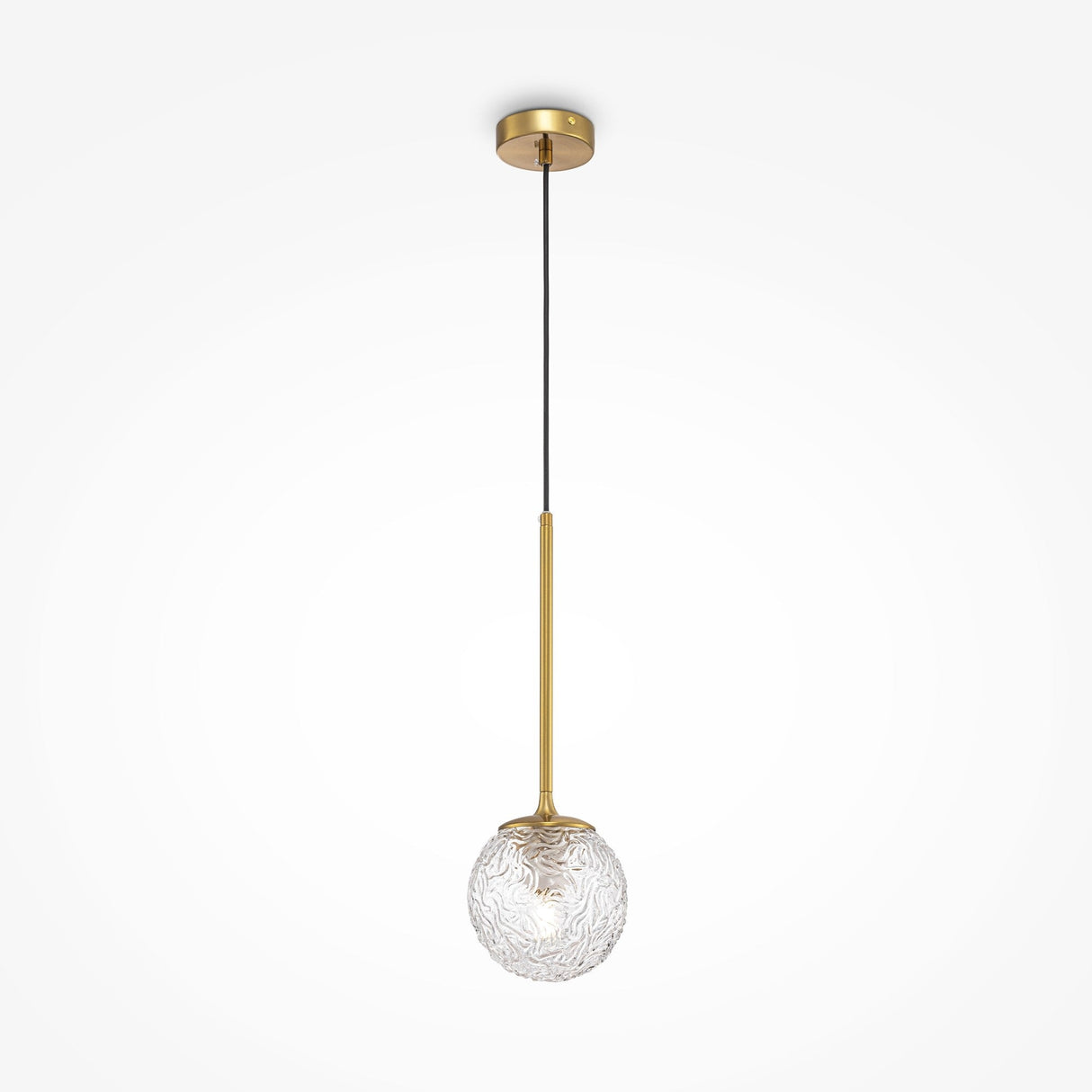The Ligero Pendant Light - Brass With Clear Moire Glass boasts a modern design with an oval moiré glass shade, suspended by a black cord from a brass fixture and ceiling plate. Gold and clear glass elements elegantly contrast against the white background, enhancing any space.