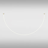 The Tau LED Pendant Light 40W features a curved, thin white line resembling a swing, suspended between small gold fixtures on a smooth light gray background. This modern decor piece is enhanced with a flexible neon silicone diffuser.