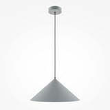 The Basic Colors Cone Pendant Light - Matte Grey features a minimalist conical shade in matte gray, suspended by a slim black cord, with a round gray ceiling mount, creating a sleek and modern design.