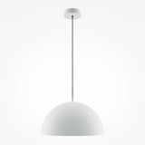 The Basic Colors Dome Pendant Light - White features a sleek white dome gracefully suspended from a black cord and white ceiling mount, set against a plain white backdrop.