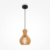 The Roots Pendant Lamp 20cm - Black With Beige Wooden Round Dome Shade showcases a modern design with a wooden cage and black cord, casting a warm glow through the slats against a white backdrop.