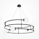 The Balance 6 Light Suspension in black, with opal globes, features a modern chandelier design. Its black metal frame forms two concentric circles with six opal glass globes elegantly balanced around them. Suspended by thin wires, it adds sophistication to any rooms décor.